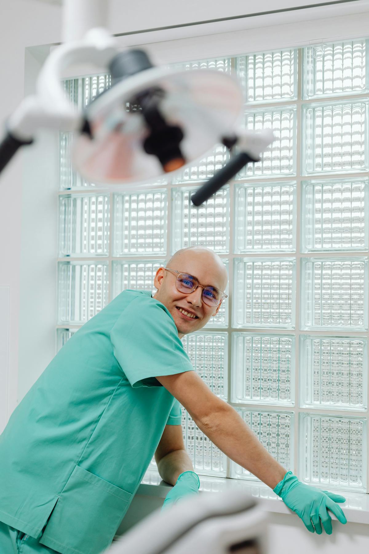 Portrait of Dr. Reyes, smiling, in the Stillwater office